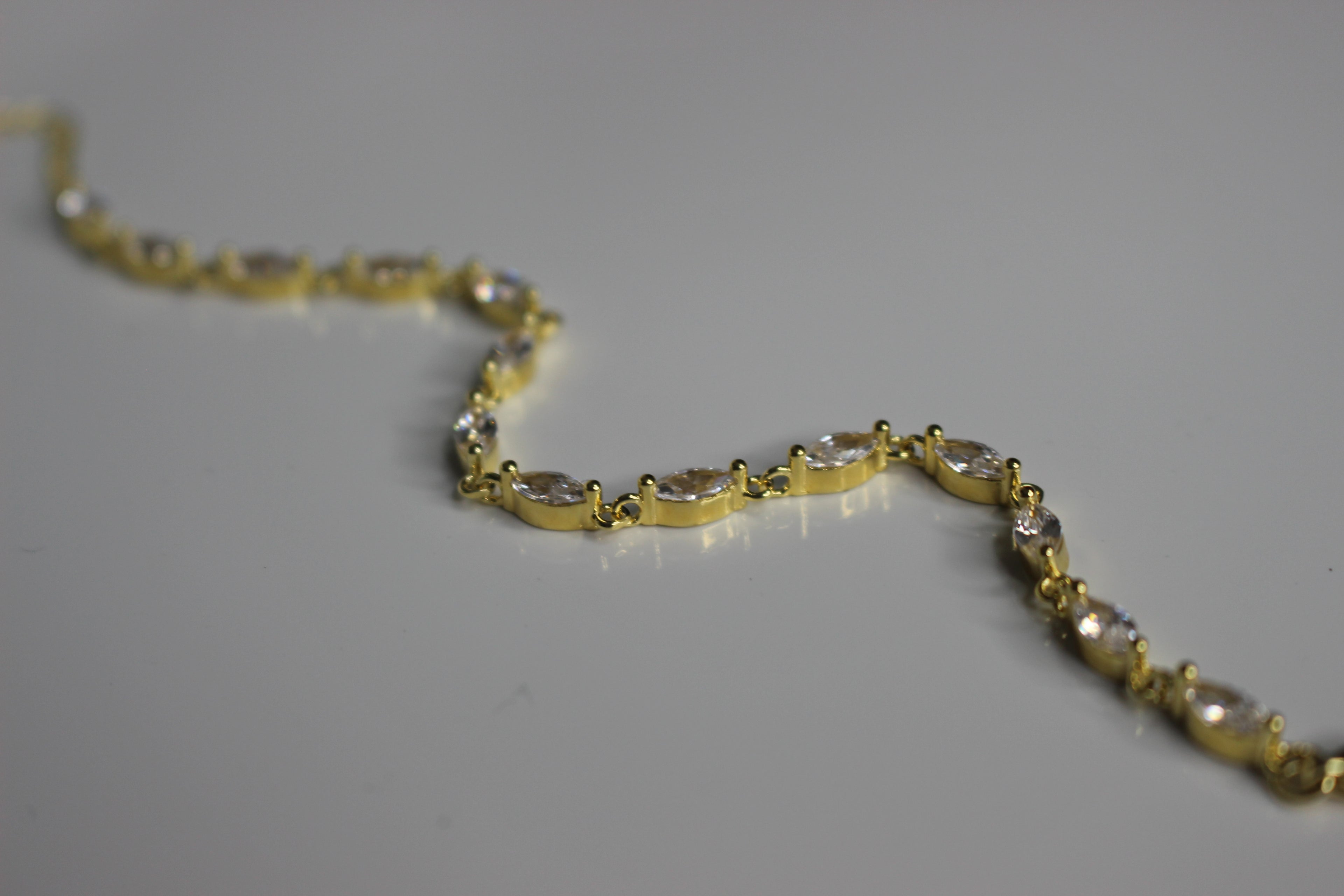 Marquise zircon 14k  gold plated .