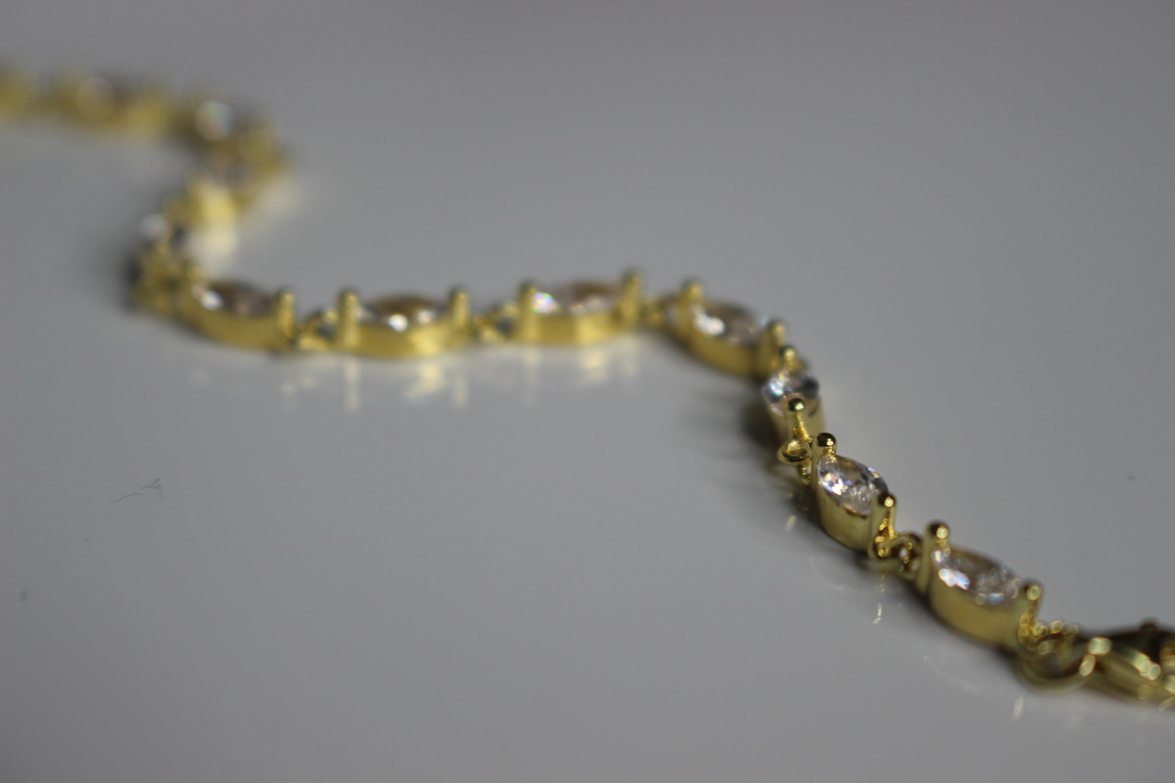 Marquise zircon 14k  gold plated .