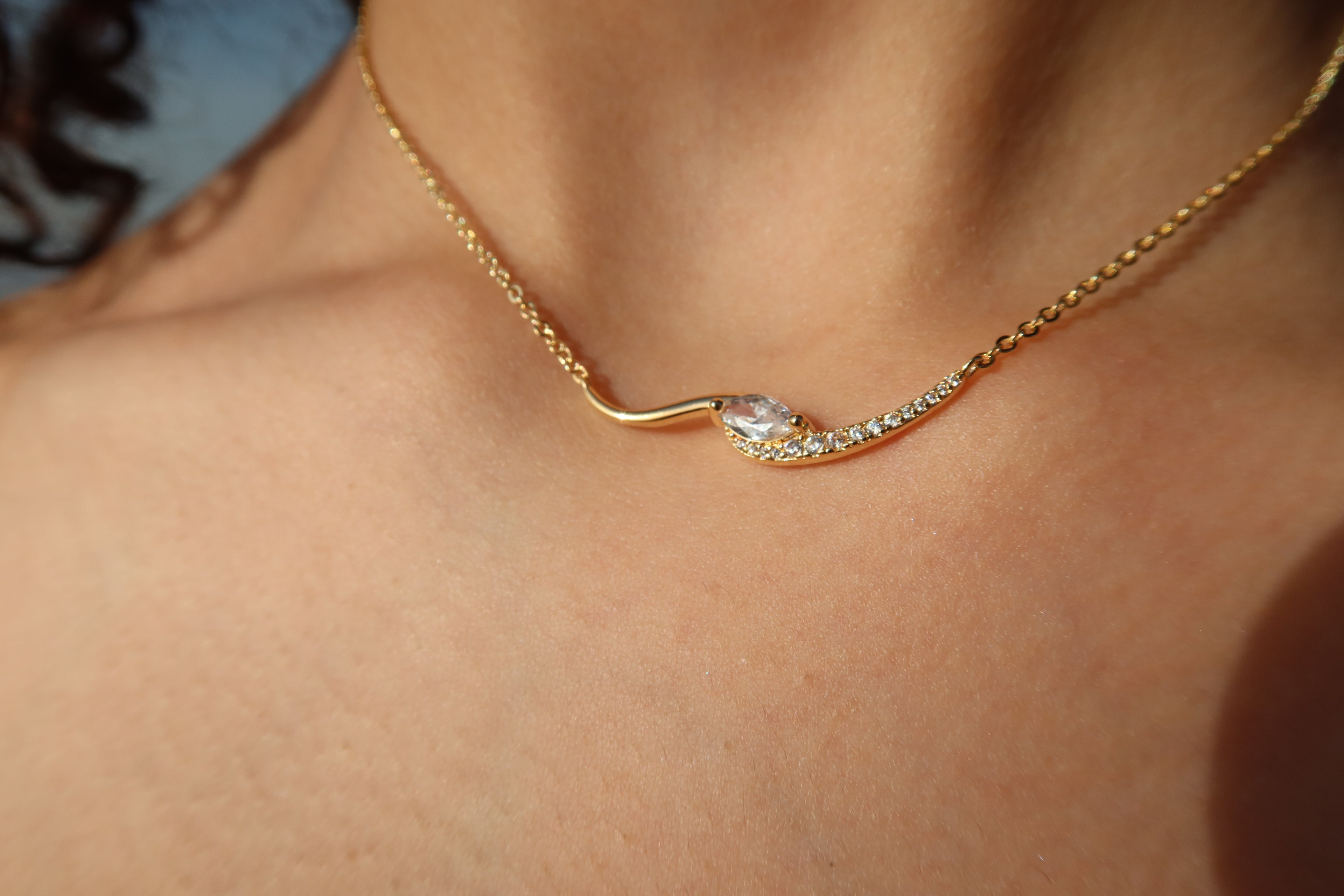 The LUNA curve necklace.
