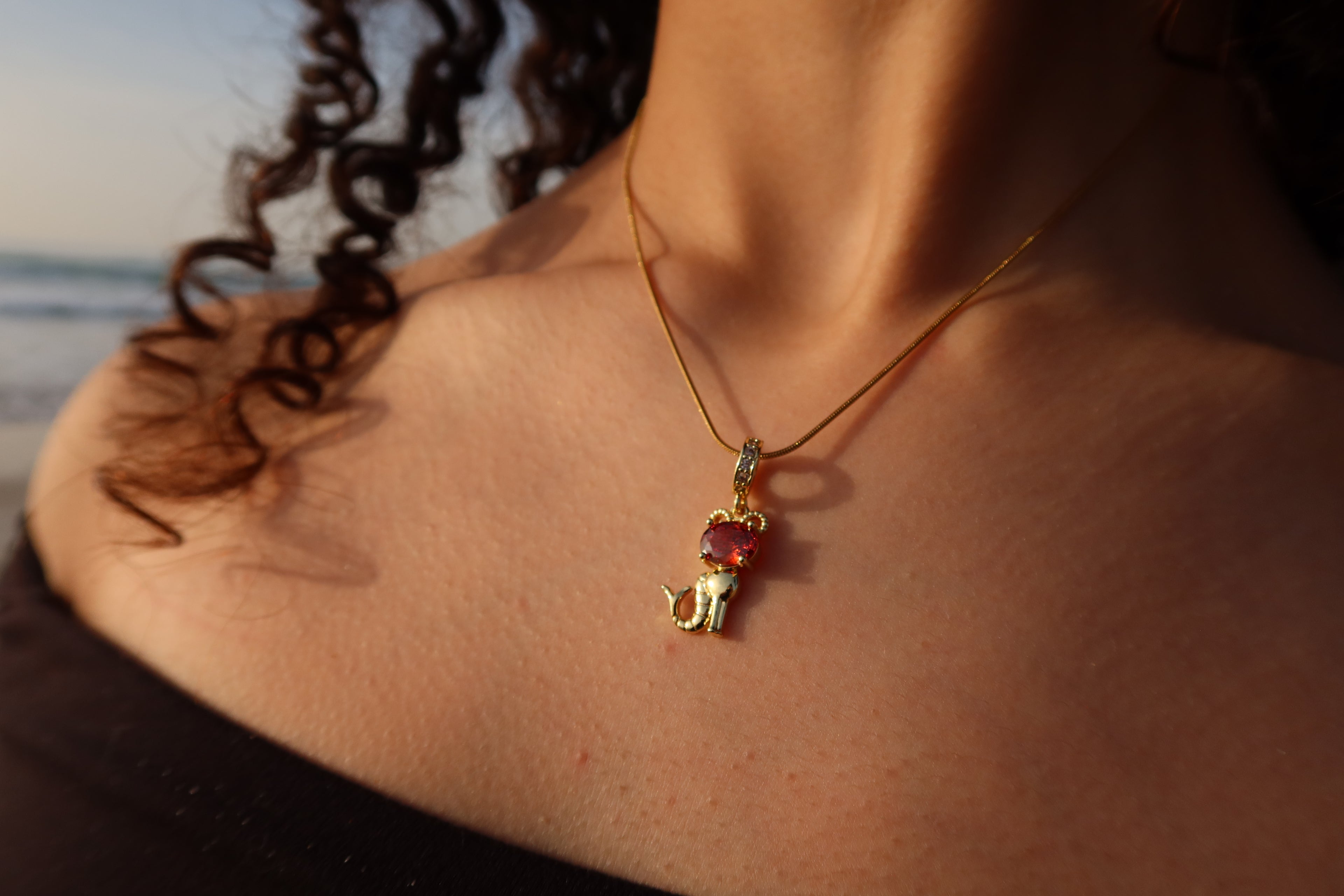 RUBY KITTY CHARM NECKLACE.