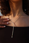 ELEGANT STAINLESS STEEL CROSS DROP NECKLACE .