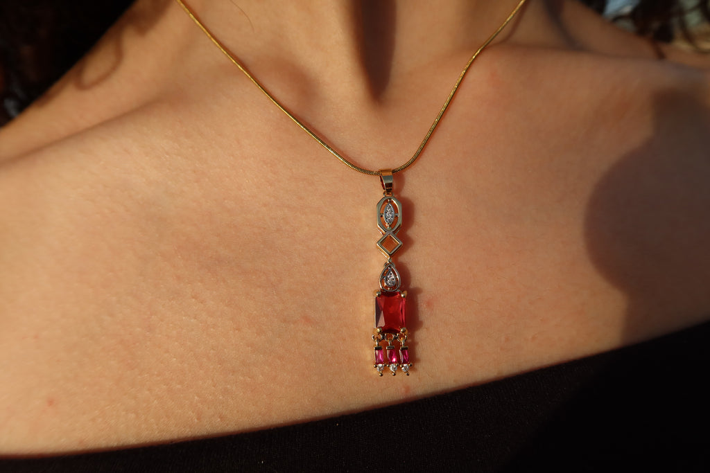 RUBY CASCADE NECKLACE .
