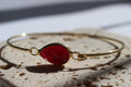 VINTAGE BURGUNDY STONE BRACELET.