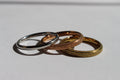 ETERNA GLOW STAINLESS STEEL BAND RINGS .