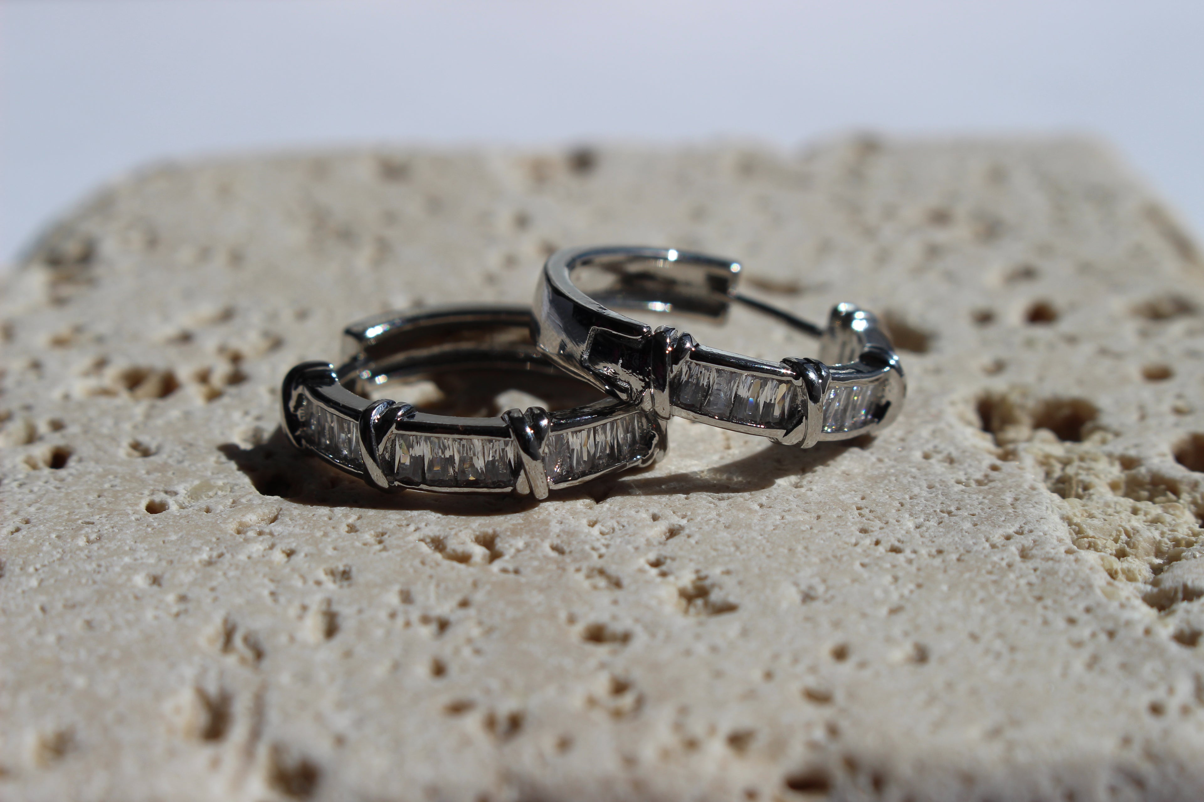 CRYSTAL HOOP EARRINGS .