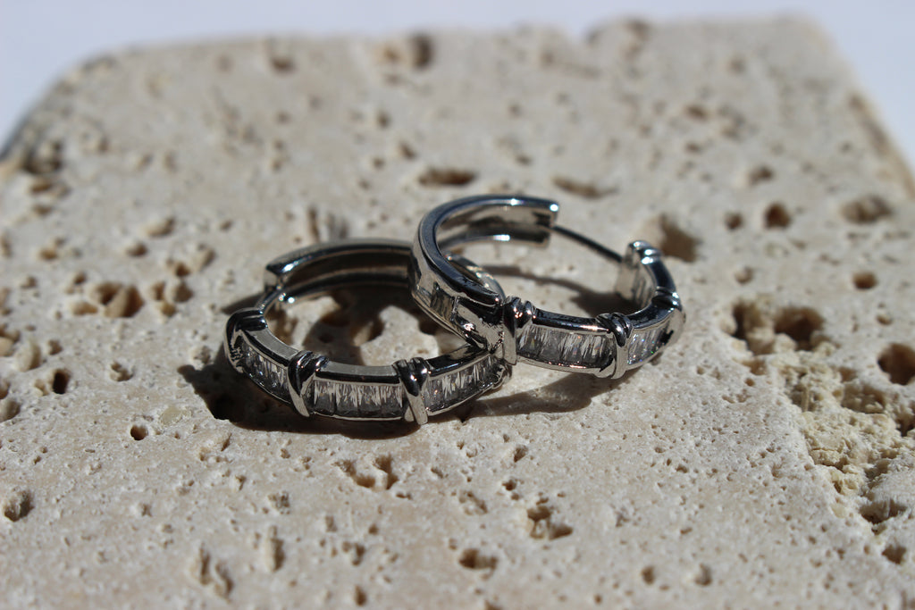 CRYSTAL HOOP EARRINGS .
