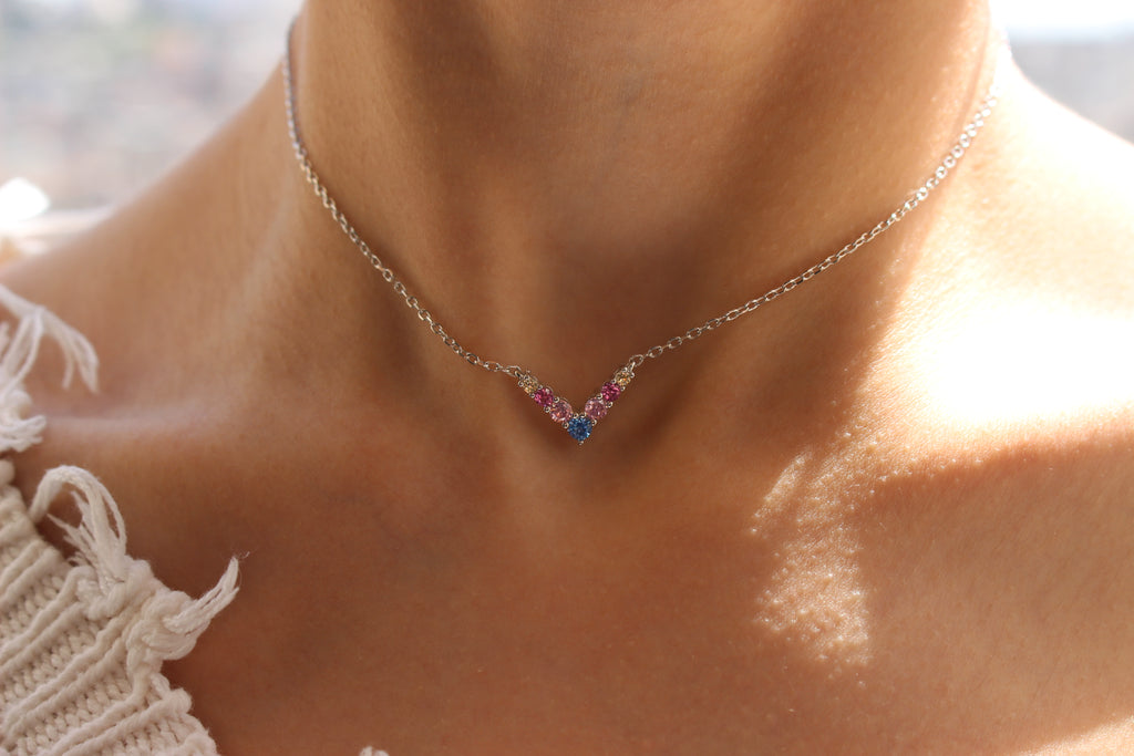 RAINBOW V NECKLACE .