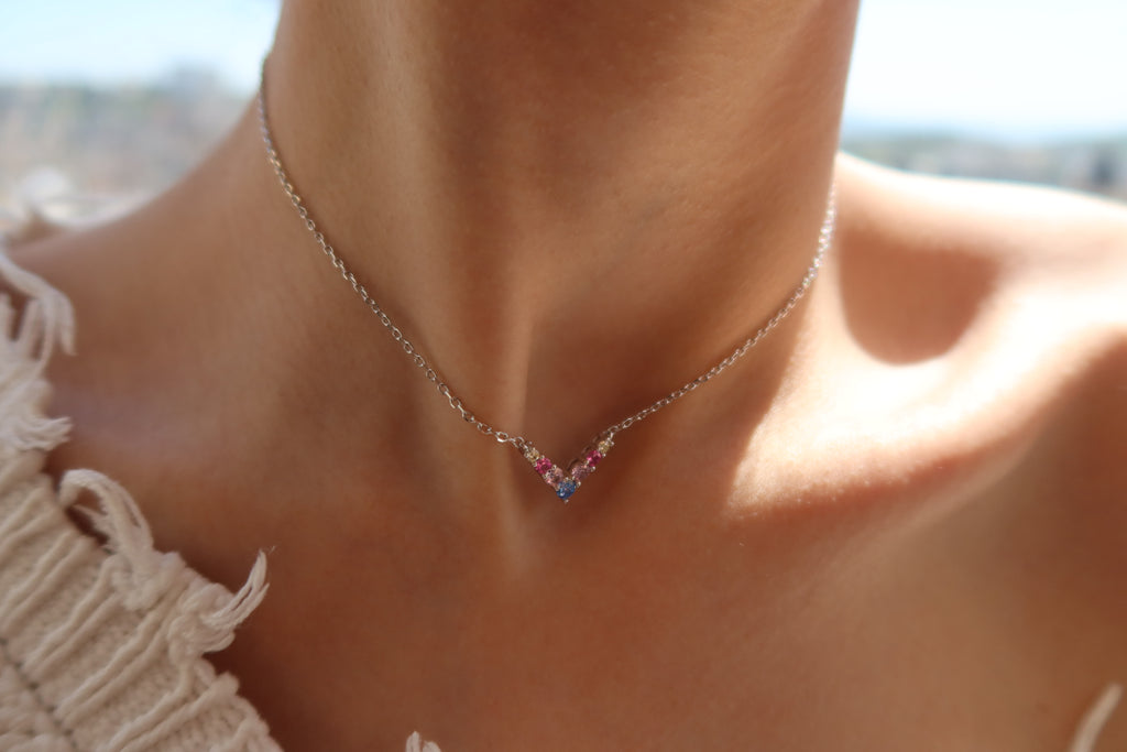 RAINBOW V NECKLACE .
