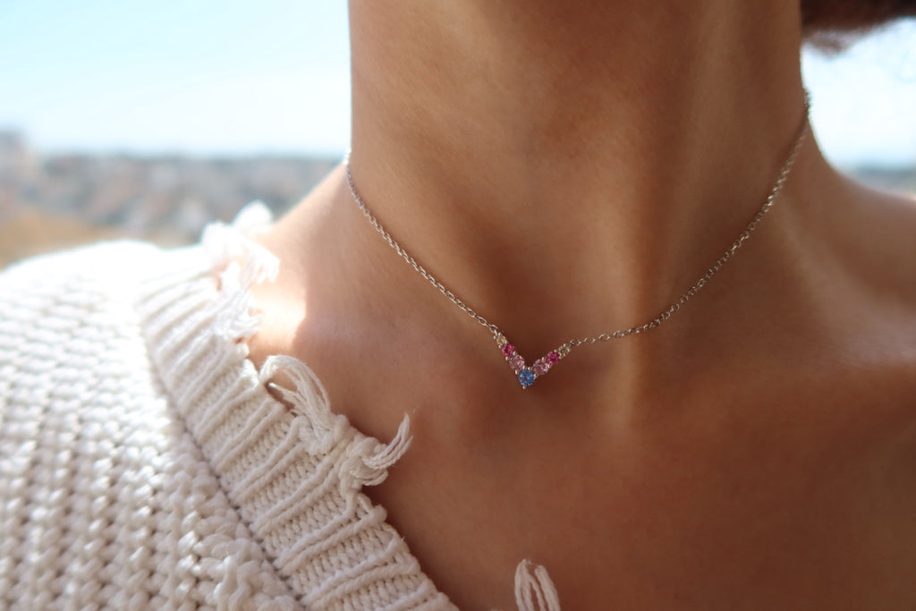RAINBOW V NECKLACE .