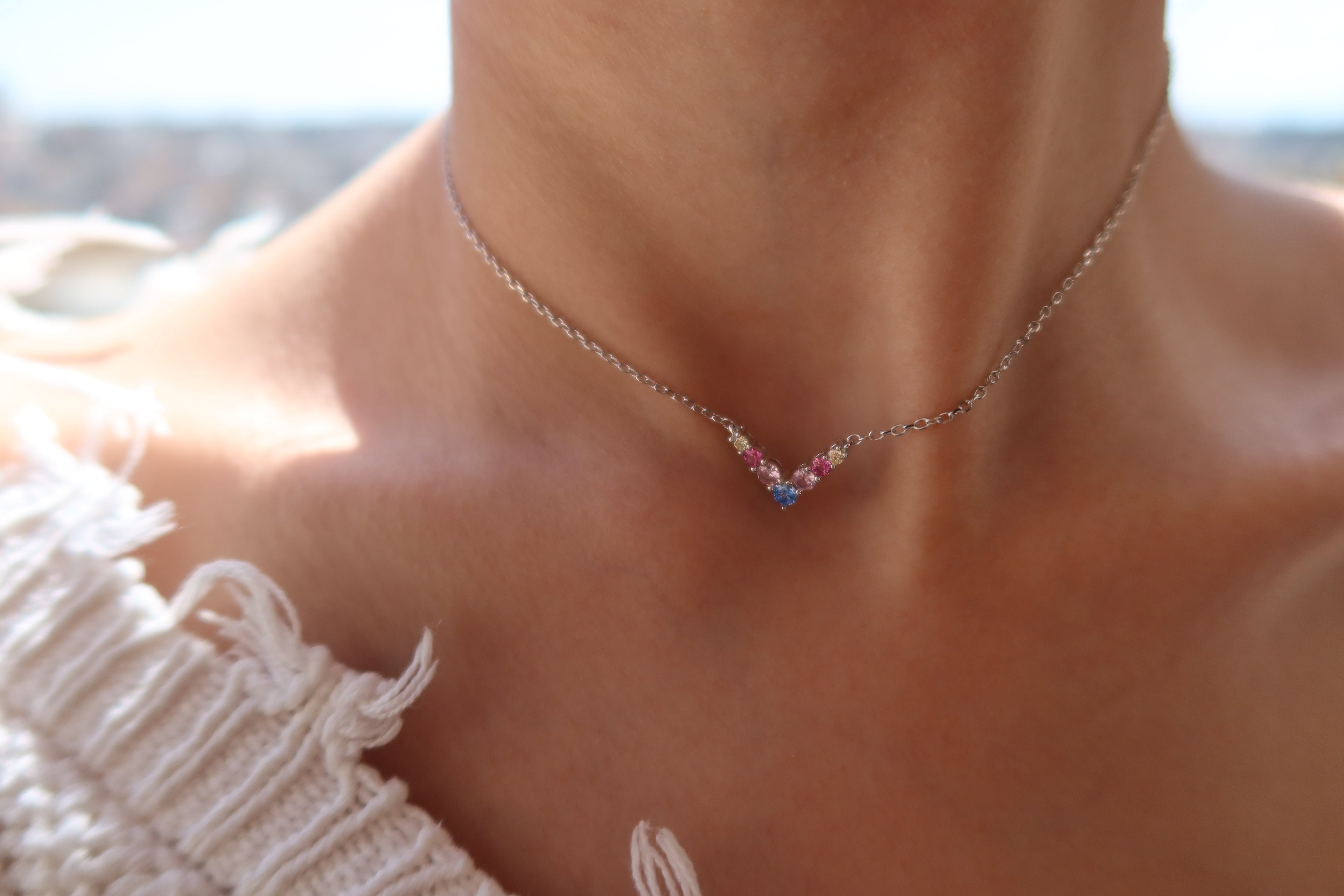 RAINBOW V NECKLACE .