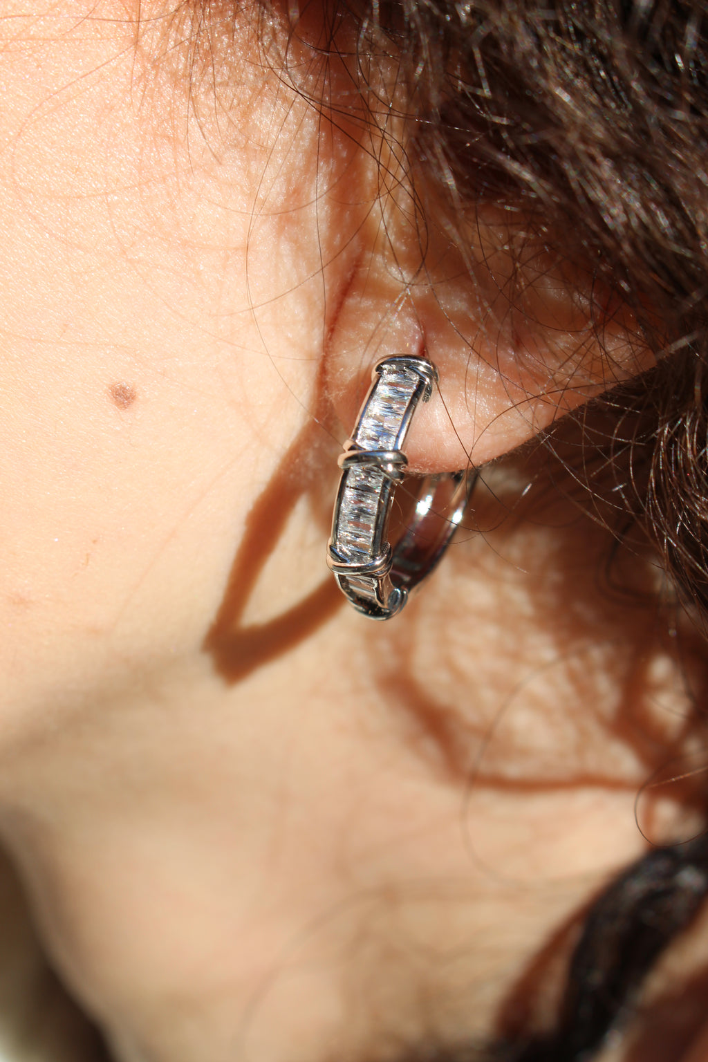 CRYSTAL HOOP EARRINGS .