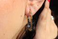 two-toned crystal hoop earrings .